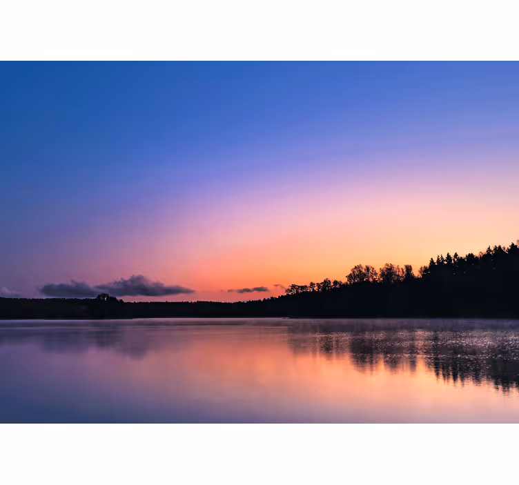 Toile fenêtre salon coucher de soleil sur le lac mazurie - TenStickers