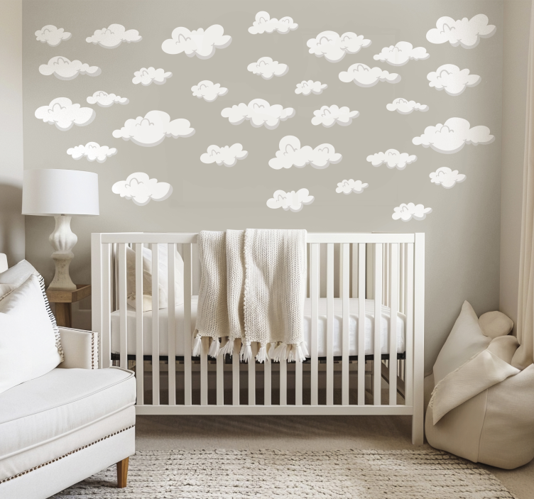 Tapisserie chambre bébé modèle de nuages - TenStickers
