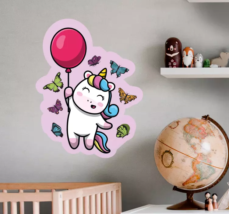 Sticker enfant licorne ludique avec ballon - TenStickers