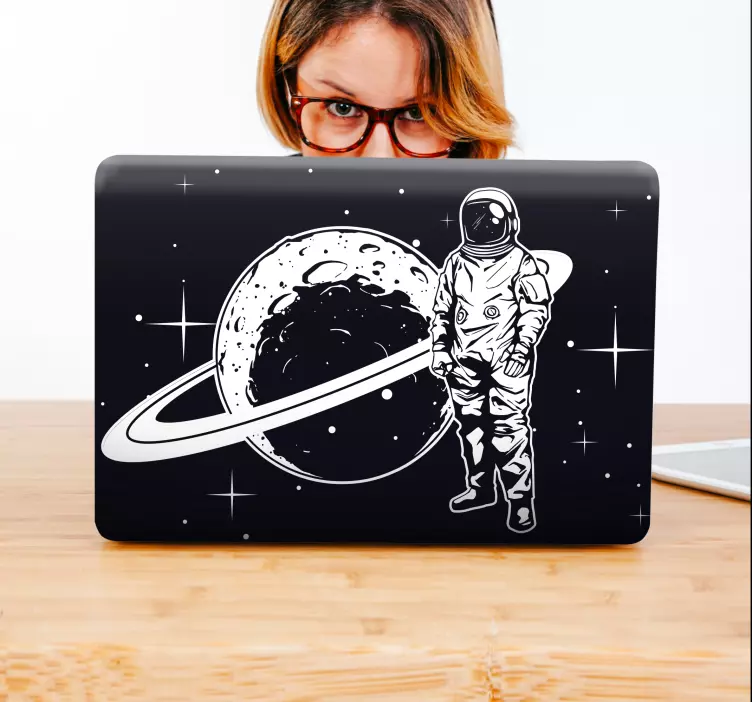 Sticker pour ordinateur astronaute et planète - TenStickers