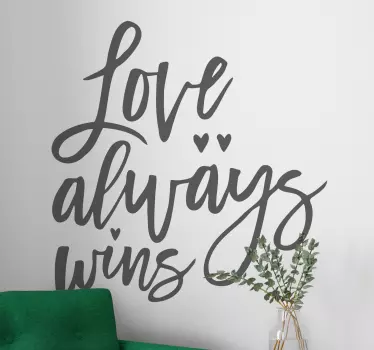 Sticker citation l'amour triomphe toujours - TenStickers